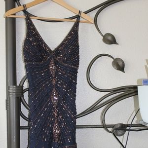 100% Silk, Navy tea length Dress, by hand beading and details.